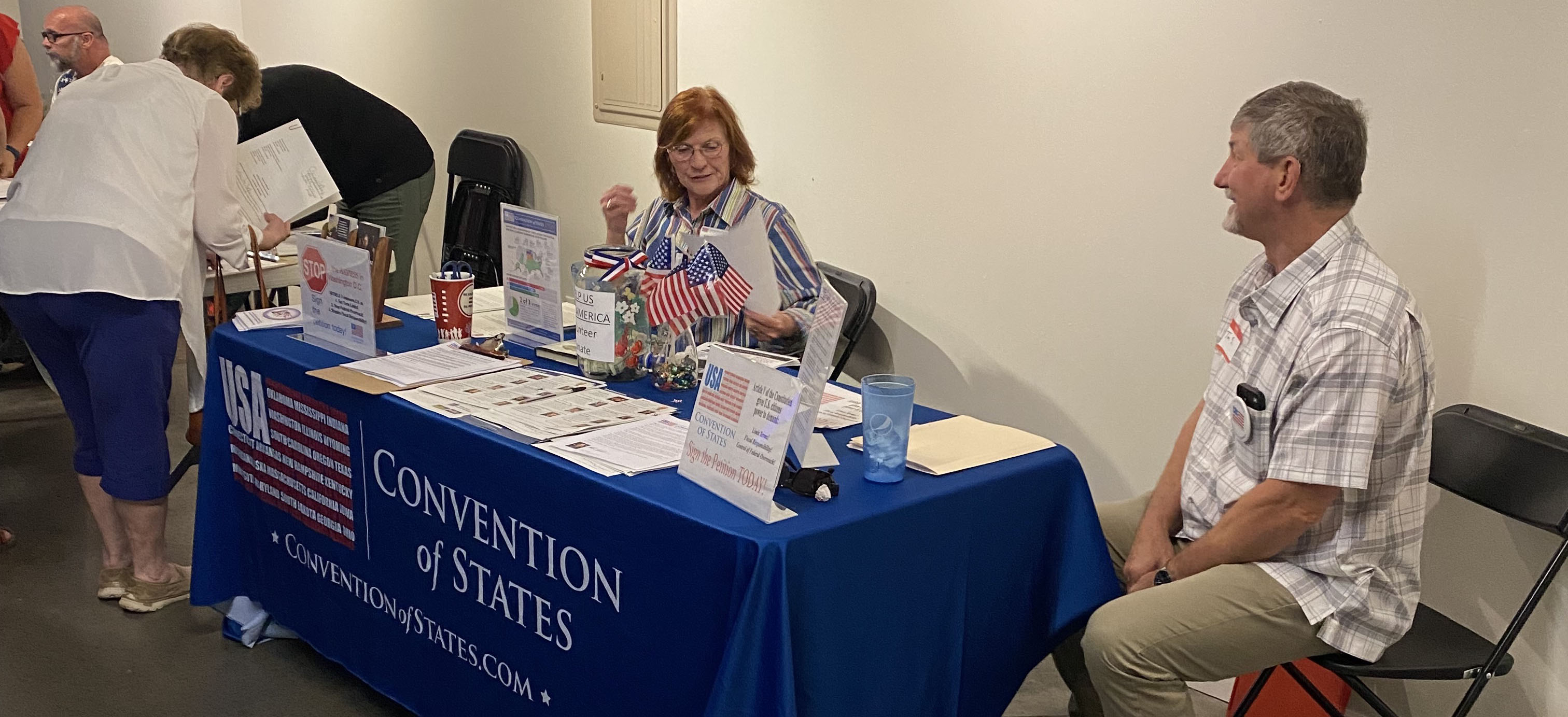 Tim and Loretta ready to take questions and share information after the meeting