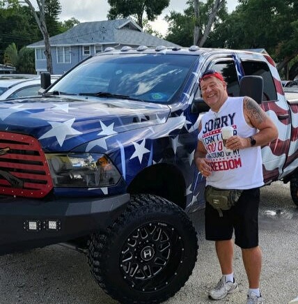 Truck wrapped in flag